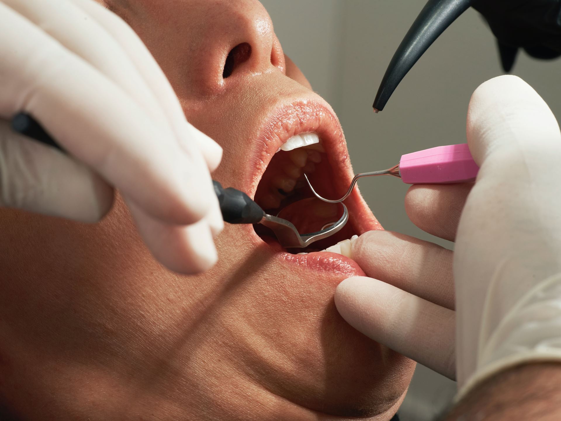 Patient sitting in dentist chair